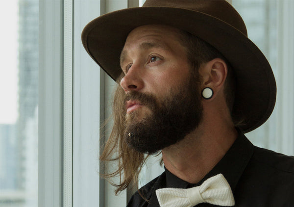 hipster wearing stylish crystal beard ornament by Italian trendy brand Krato Milano